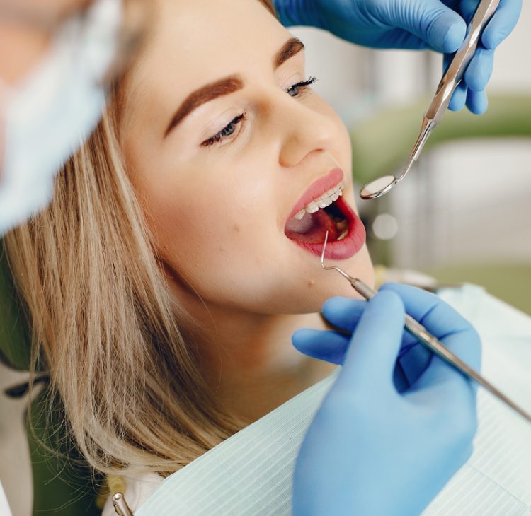 beautiful girl sitting dentist s office 001 750x730 1